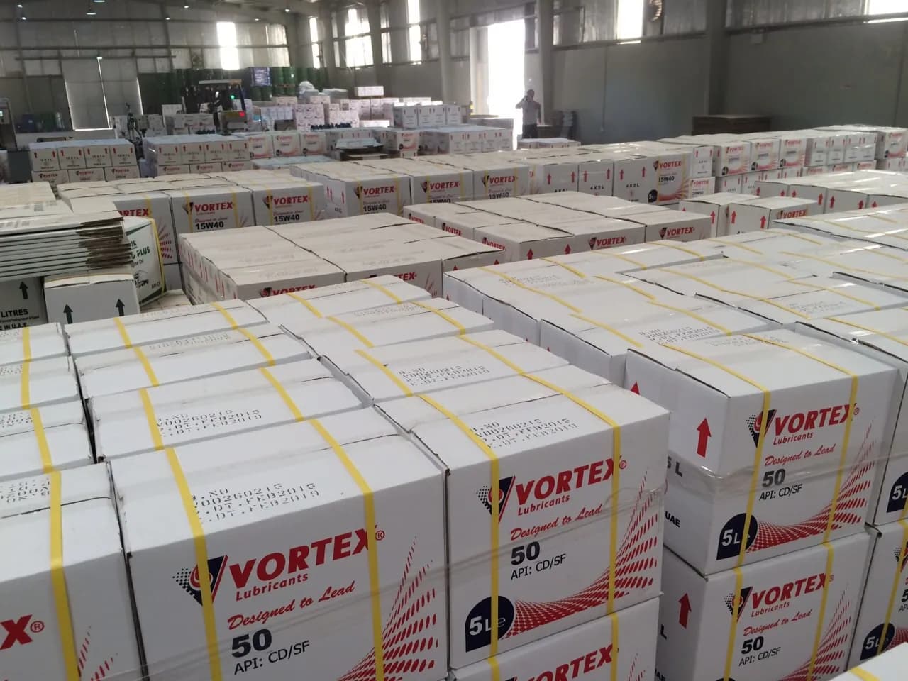 Rows of Vortex cartons on the warehouse floor