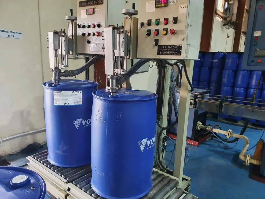 Blue Vortex drums on the roller conveyor at the drum filling station